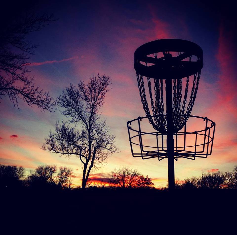 Disc Golf Basket During Sunset